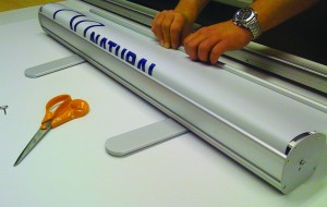 Changing the graphic on a roller banner stand takes only a few minutes