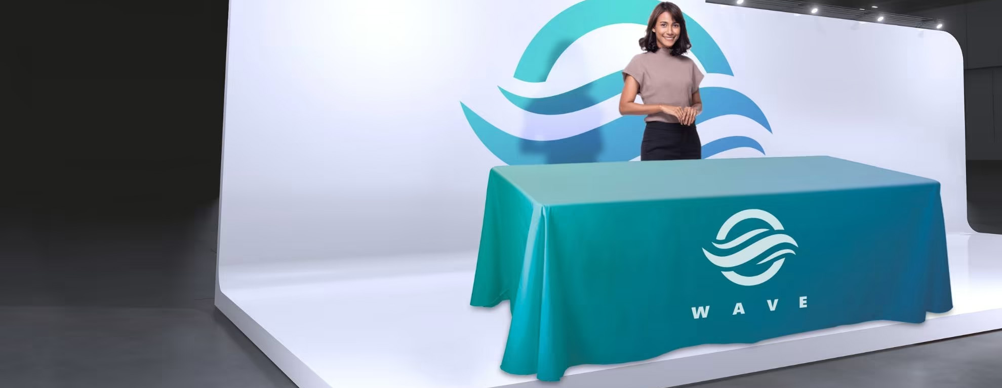 A picture of a custom printed tablecloth on a table with a lady standing behind it